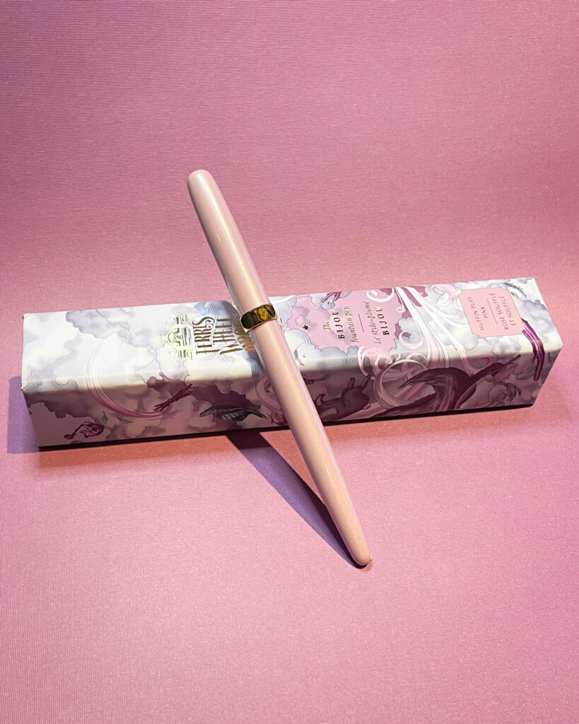 Ferris Wheel Press Bijou pen in Huffin Puff Pink colourway, with its pen box